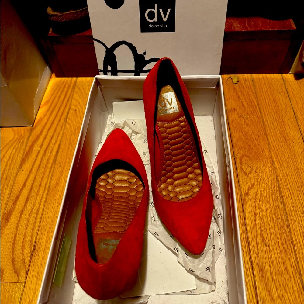 Red suede pumps